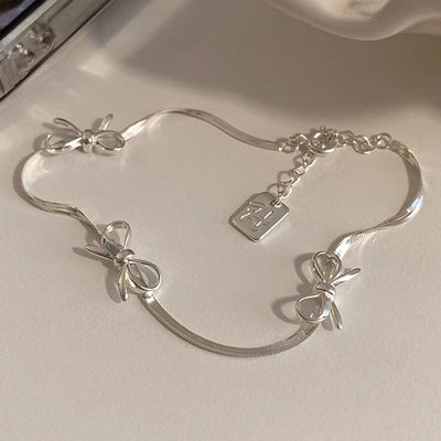 Luna Silver Bow Snake Chain Bracelet